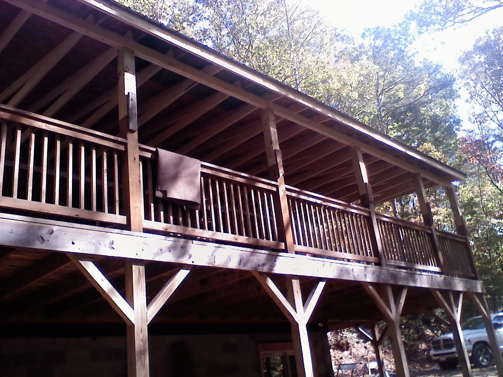 Timber framing under a new elevated porch and deck — Roof Leak Repair in Four Oaks by Roofing Brothers